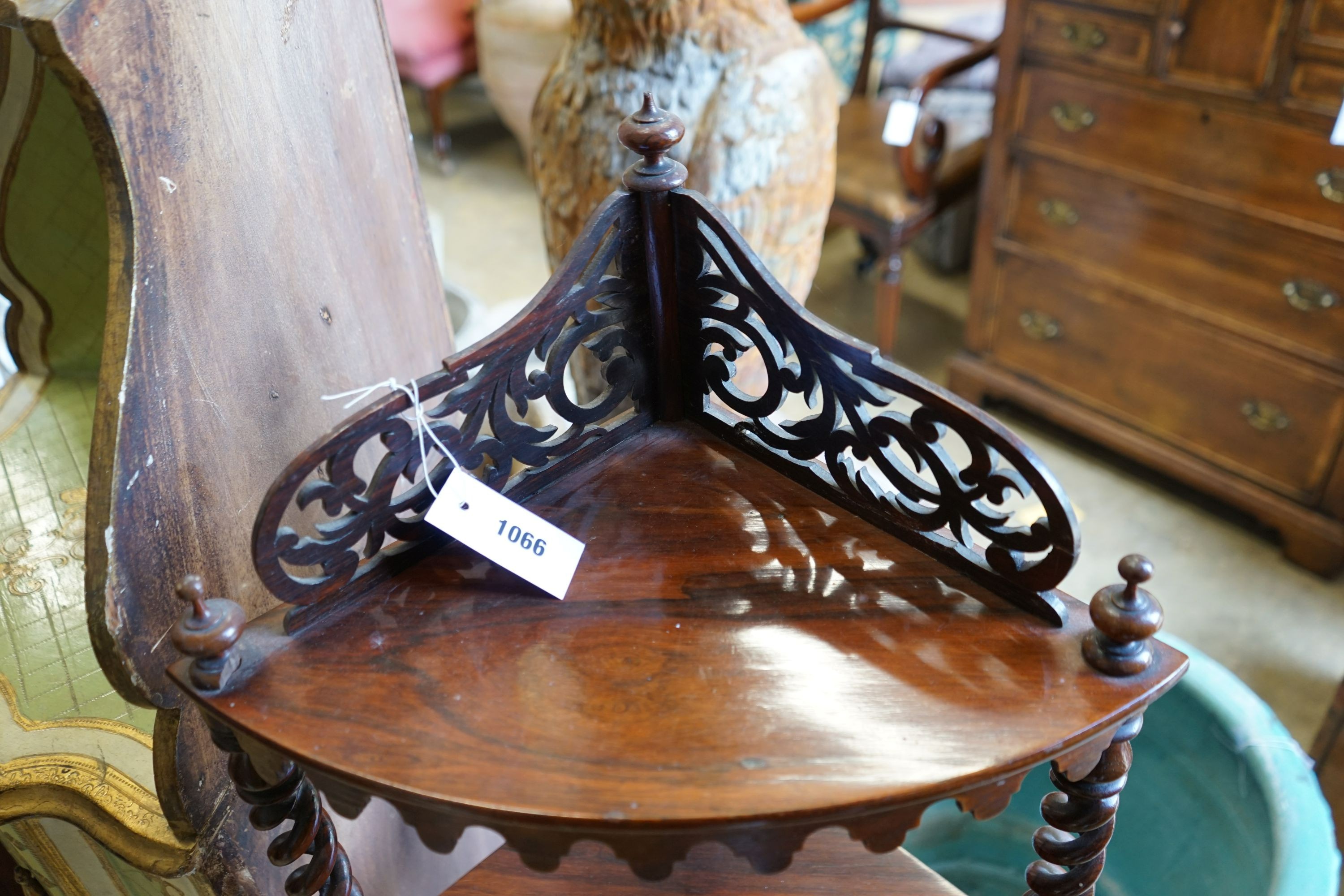 A Victorian rosewood bow front four tier corner whatnot, width 58cm, depth 36cm, height 122cm